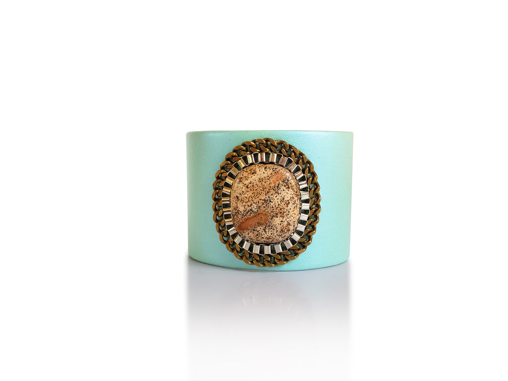 Mint leather cuff with jasper stone centerpiece , adorned by silver and brass chains.