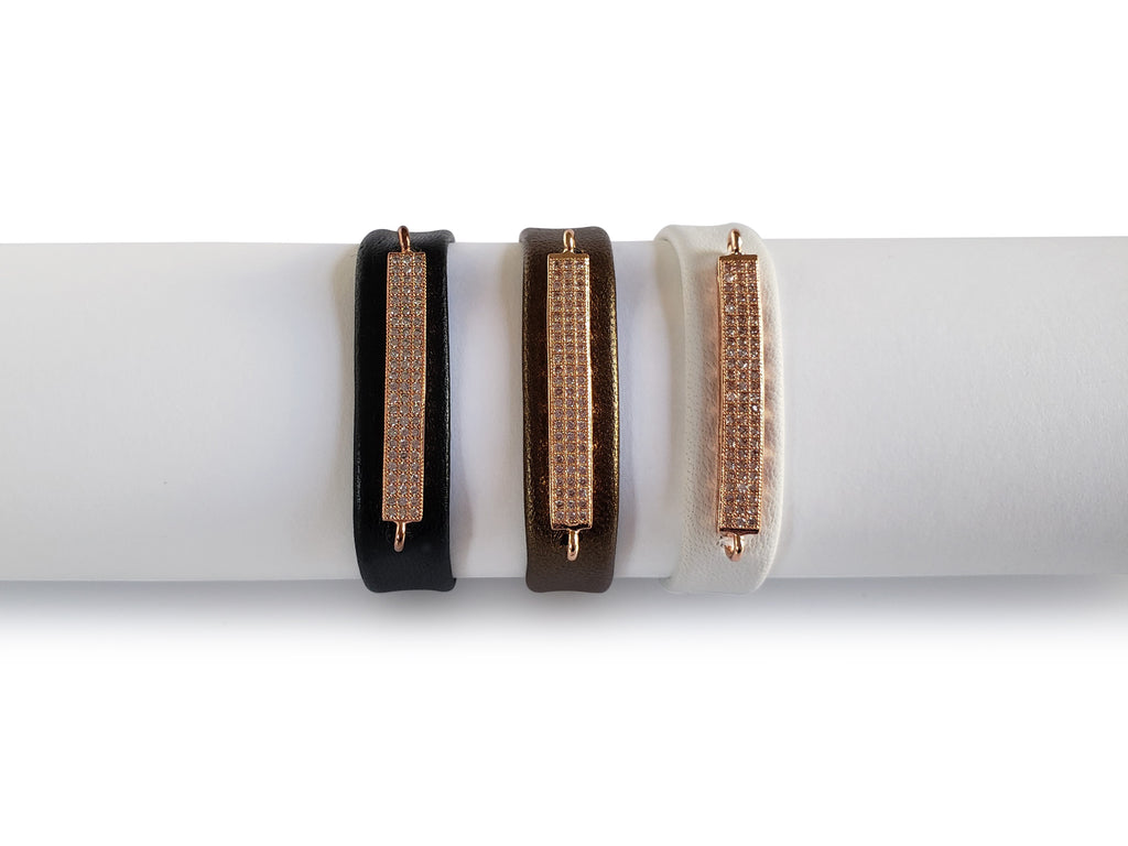 0,5 inches wide leather bracelets in black,bronze and white leather with micro pave rose gold bar.