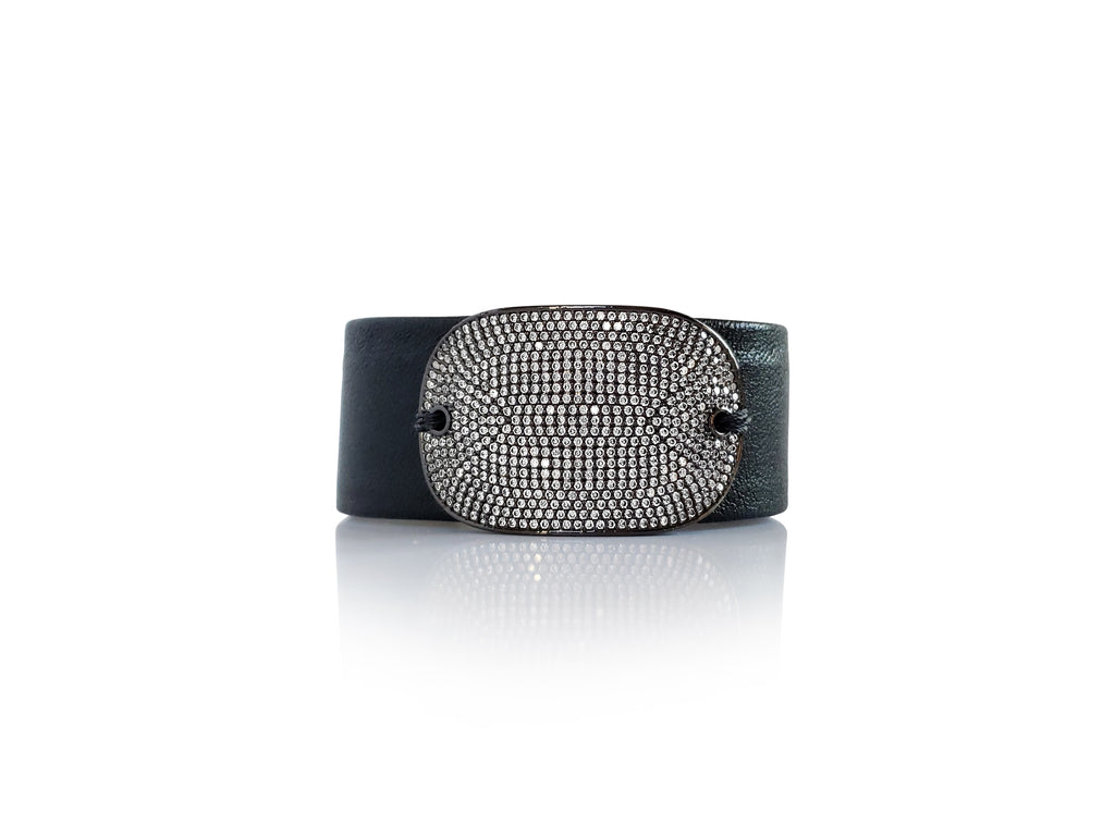 Magnetic black leather bracelet with oversized Micro Pave SZ rectangle in gunmetal color.