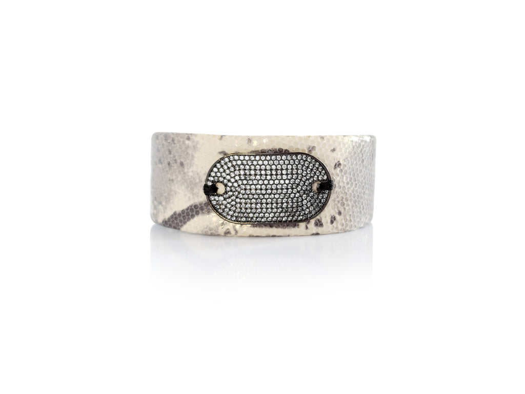 Magnetic leather bracelet in python leather with gunmetal,crystal micro pave SZ tag.