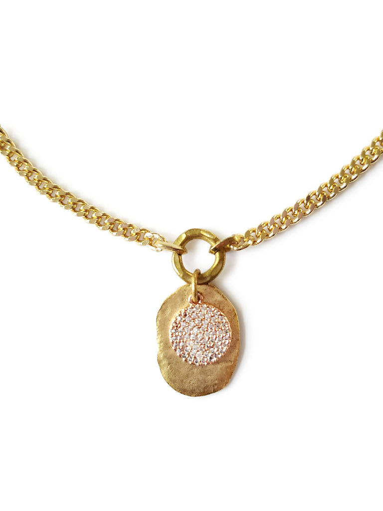 Gold color disc with rose gold micro pave SZ coin in crystal cubic zirconia.